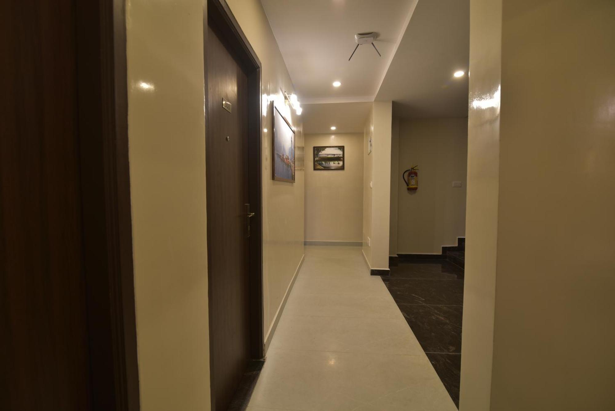 Address 24 Inn Bangalore Eksteriør bilde