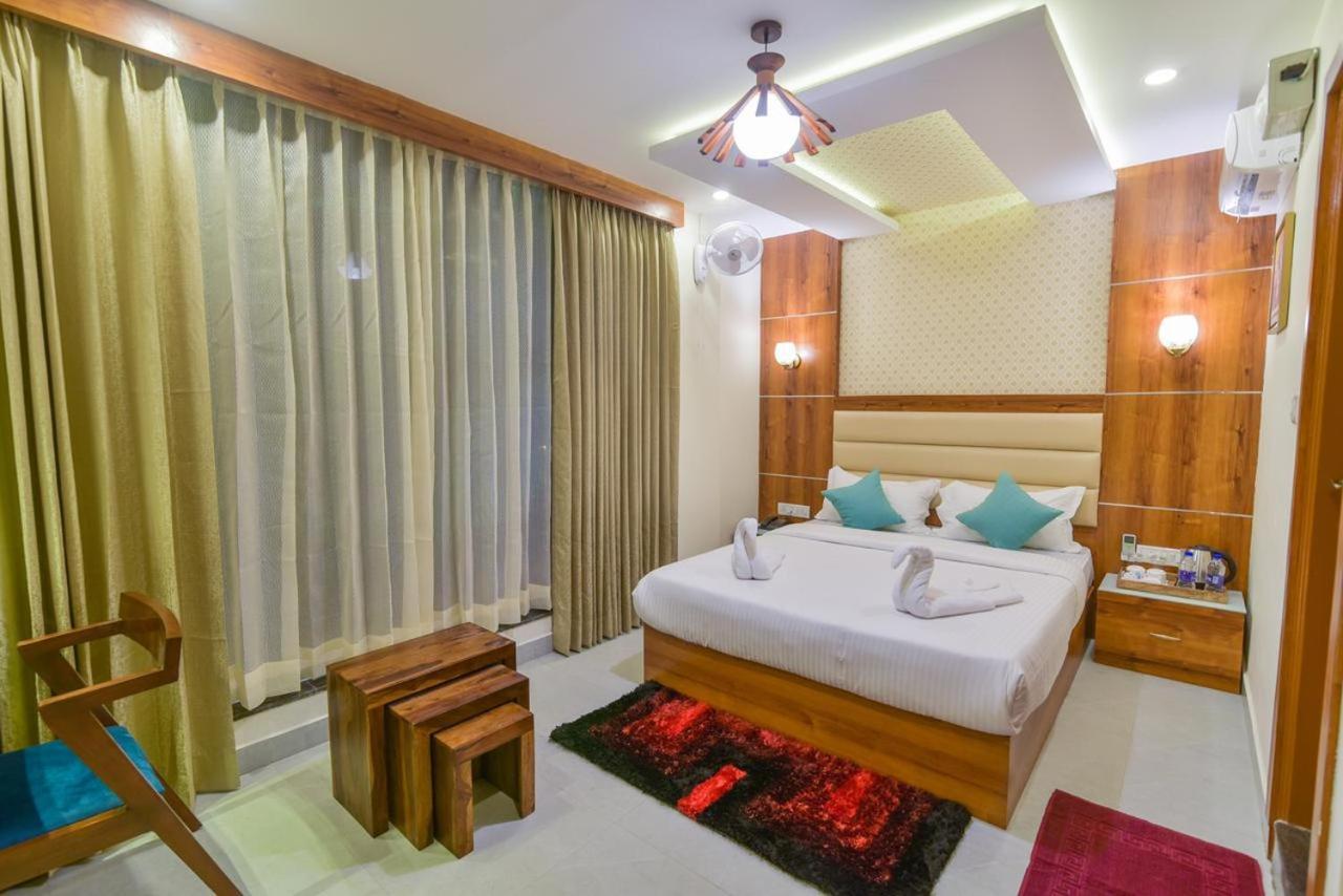 Address 24 Inn Bangalore Eksteriør bilde