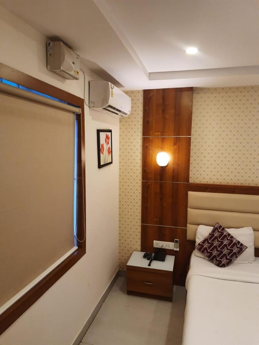 Address 24 Inn Bangalore Eksteriør bilde