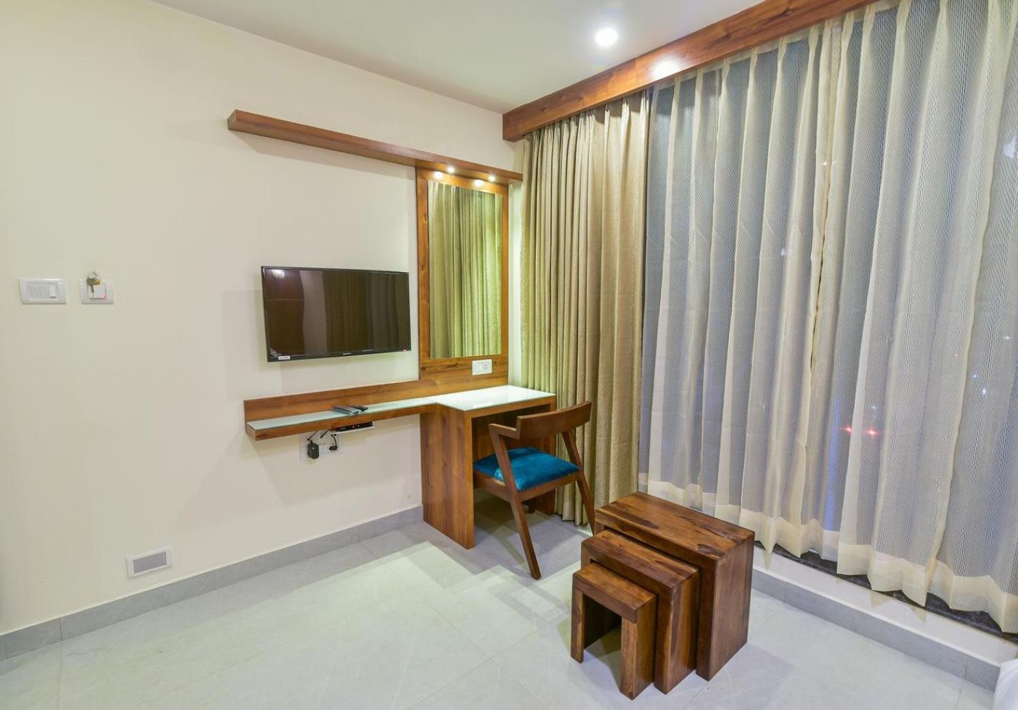Address 24 Inn Bangalore Eksteriør bilde